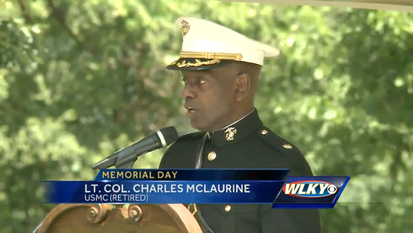 Lt Col. Charles McLaurine speaking during memorial service