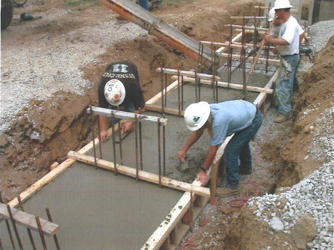 Leveling the wet cement