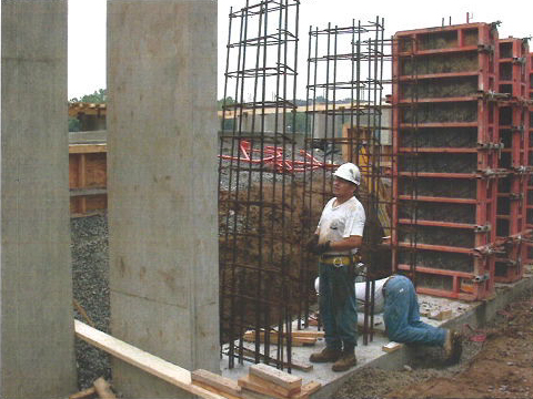 Worker overseeing construction